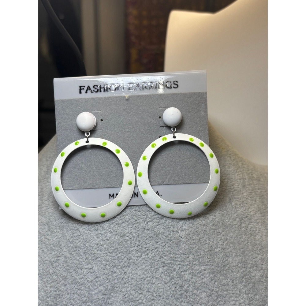 #20. Retro style neon, green polkadot earrings.